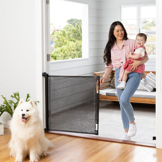 Extra-Wide Retractable Baby & Pet Gate - 31" Tall, Extends up to 71" Wide, Easy One-Hand Operation, Family Choice Award Winner, Safe for Kids & Pets, Indoor & Outdoor, Black