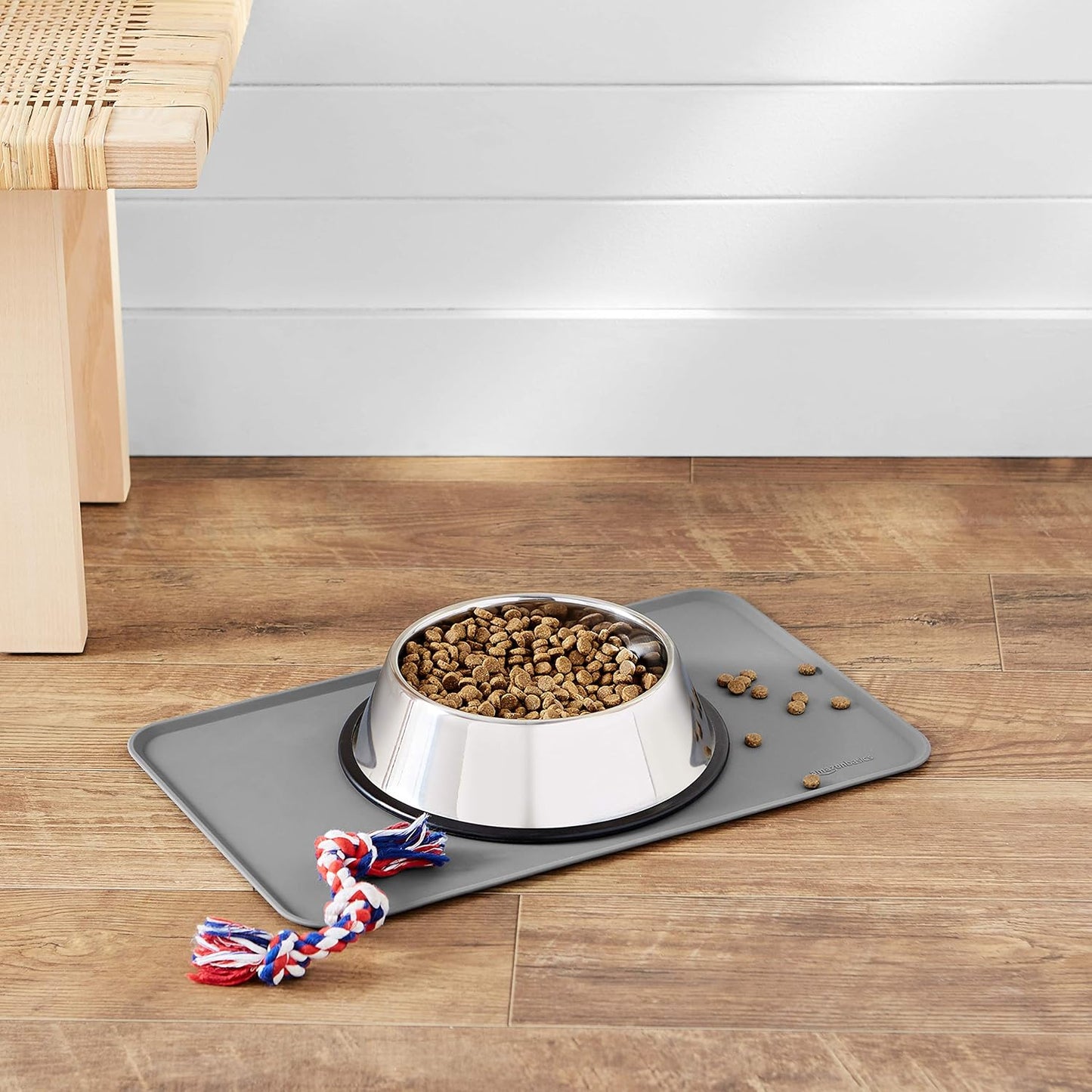 Amazon Basics Waterproof Non-Slip Silicone Pet Feeding Mat with Raised Edges for Food and Water Bowls, Easy to Clean Pet Placemat to Protect Floors, 18.5" x 11.5", Black